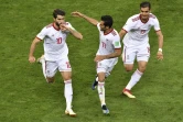 La joie des Iraniens après l'égalisation face au Portugal, signé Karim Ansari Fard (N.10) à Saransk, le 25 juin 2018