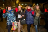 Des manifestantes exhibent un gant rouge pour protester contre le maintien en liberté des membres de "La Meute", le 7 janvier 2019 à Pampelune