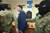 Le journaliste russo-ukrainien Kyrylo Vyshynsky, responsable en Ukraine de l'agence de presse russe RIA Novosti, après une comparution devant un tribunal à Kherson, dans le sud de l'Ukraine, le 17 mai 2018