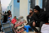 Des déplacés syriens emménagent dans un complexe résidentiel, construit près de la ville d'al-Bab, le 9 février 2022 en Syrie 