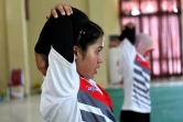 Depuis mars, 15 joueurs et joueuses de la sélection indonésienne vivent sept jours sur sept dans une enceinte de la police d'élite de Jambi, ville sur l'île de Sumatra