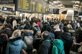 Des passagers en attente d'un train le 8 février 2016 à la gare de Lyon-Part-Dieu à Lyon