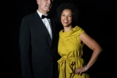 Alicia Thompson et John Clark posent avant le dîner de Noël du Rand Club à Johannesburg le 6 décembre 2018