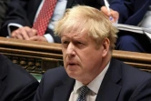 Photo fournie par le Parlement britannique montrant le Premier ministre Boris Johnson à la Chambre des Communes, à Londres le 12 janvier 2022