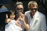 Johnny Hallyday, sa femme Laeticia et leur fille Jade, aux Baux-de-Provence le 29 juillet 2006