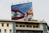 Affiche électorale pour le scrutin législatif du 6 mai au Liban, dans une zone industrielle de la banlieue de Beyrouth, le 3 avril