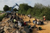 Des manifestants sur le site de la route L277, près de la mine de charbon de Garzweiler, en Allemagne, le 22 juillet 2020