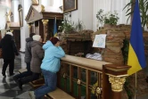Prières dans la cathédrale de l'Assomption de la Bienheureuse Vierge Marie, à Odessa, dans le  sud de l'Ukraine, le 17 avril 2022