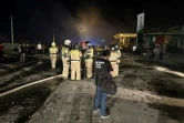 Photo diffusée le 15 août 2023 par le ministère russe des Urgences de secouristes sur les lieux d'un incendie après une explosion d'une station-service à Makhachkala, au Daguestan 