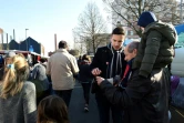 Un militant de "La France insoumise" de Mélenchon tracte le 15 février 2015 à Roubaix 