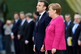 La chancelière allemande Angela Merkel (d) et le président français Emmanuel Macron, lors d'une rencontre à Berlin le 15 mai 2017