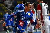 La joie de l'ailier et capitaine de l'équipe de France, Michael Guigou,  après un but marqué contre la Hongrie, lors du quart de finale du Mondial de handball, le 27 janvier 2021 dans la Ville du 6 Octobre, un faubourg près du Caire