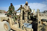 Des soldats des troupes du maréchal Haftar patrouillent dans les environs de Benghazi, le 28 janvier 2017 en Libye