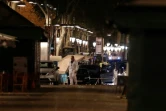 La police scientifique est toujours à la nuit tombée sur les lieux du drame, le 17 août 2017 sur les Ramblas de Barcelone 
