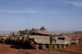 Des chars israéliens Merkava participent à un exercice près de la frontière avec le Liban, le 26 octobre 2023