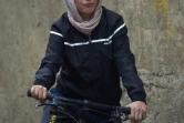 Kobra Samim sur sa bicyclette à Kaboul, le 14 avril 2019