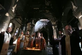 Une messe est célébrée dans l'église de l'Immaculée Conception le 30 octobre 2016 à Qaraqosh, reprise au groupe Etat islamique