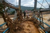 Un pont détruit par la crue dans le village de Banjar Irigasi, dans la province indonésienne de Banten, le 2 janvier 2020