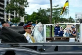 Le prince Abdul Mateen et son épouse Yang Mulia Anisha Rosnah en voiture dans les rues de Bandar Seri Begawan, à l'occasion de leur mariage, le 14 janvier 2024 au Brunei