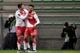 L'attaquant monégasque Sofiane Diop est félicité par l'attaquant monténégrin Stevan Jovetic, après avoir marqué le 3e but pour son équipe face à Saint-Etienne, le 19 mars 2021 au stade Geoffroy Guichard