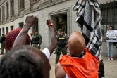 Des manifestants protestent contre l'acquittement d'un policier impliqué dans l'homicide de Freddie Gray, devant le tribunal de Baltimore (Maryland), le 23 mai 2016