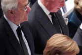 L'ex-Premier ministre britannique John Major (à gauche), à côté du prince Charles et derrière la chancelière allemande Angela Merkel, lors des funérailles de l'ancien président américain George H. W. Bush, le 5 décembre 2018 à Washington