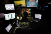 Des soldats de la Marine française travaillent au centre d?opérations de la frégate furtive La Fayette qui patrouille depuis trois mois en Méditerranée orientale, le 26 octobre 2020