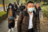 Ren Quanniu (c) un des avocats de Zhang Zhang arrive au tribunal à Shanghai, le 28 décembre 2020