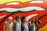 Le batteur des Rolling Stones, Charlie Watts (à gauche) au côté de, dans l'ordre, Mick Jagger, Ron Wood et Keith Richards, à New York le 7 mai 2002