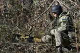 Un membre du nouveau "Bataillon sibérien" au sein des forces armées ukrainiennes participe à un entraînement militaire, le 24 octobre 2023 près de Kiev