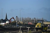 Des travaux en vue de la construction d'un parking pour camions près d'Ashford (Grande Bretagne) le 17 décembre 2020