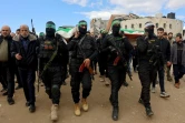 Des combattants de la branche armée du Hamas lors d'obsèques de deux membres de leur formation à Gaza, le 24 ajnvier 2025