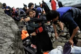 Migrants et réfugiés à leur arrivée le 30 septembre 2015 sur l'île grecque de Lesbos