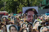 Des Birmans manifestent leur soutien à leur dirigeante Aung San Suu Kyi à Rangoun le 10 décembre 2019