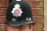 Un officier de police se tient devant la mosquée de Didsbury à Manchester, le 24 mai 2017