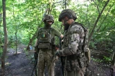 Des garde-frontières ukrainiens à la frontière avec la Russie, dans la région de Kharkiv le 5 juillet 2023