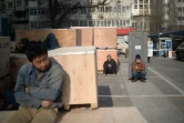 Des travailleurs chinois le 14 janvier 2016 à Pékin 