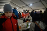 Des évacués de Marioupol accueillis dans la ville de Zaporijjia sous contrôle ukrainien, le 21 avril 2022
