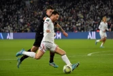 L'attaquant du PSG Lionel Messi à la lutte avec le milieu rennais Baptiste Santamaria, le 11 février 2022 au Parc des Princes  