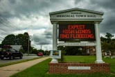 Un panneau lumineux à l'extérieur de la mairie de Wareham, dans le Massachusetts (nord-est des Etats-Unis) le 20 août 2021, prévenant de conditions dangereuses avant l'arrivée de l'ouragan Henri