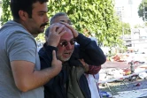 Un homme choqué le 10 octobre 2015 à Ankara après le pire attentat meurtrier de l'histoire de la Turquie