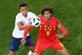 Le Belge Marouane Fellaini (d) et l'Anglais Trent Alexander-Arnold à la lutte, le 28 juin 2018 à Kaliningrad