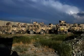 Des véhuciles militaires stationnés dans la base américaine de Bagram après le départ des troupes de l'Otan le 5 juillet 2021  