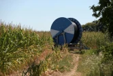 Système d'irrigation dans un champ de maïs à Chevannes le 7 août 2020