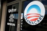 Le logo Obamacare sur la vitrine d'une agence d'assurance santé, le 10 janvier 2017 à Miami, en Floride