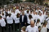 Le président colombien Ivan Duque (au centre) participe à un rassemblement contre le terrorisme le 20 janvier 2019 à Bogota, trois jours après un attentat meurtrier dans la capitale
