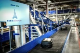Des bagages tournent sur des tapis roulants dans la zone de tri de l'aéroport d'Orly, le 24 juin 2020 quelques jours avant sa réouverture