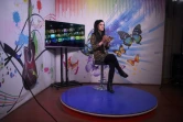 La présentatrice afghane Krishma Naz enregistre une émission pour Zan TV, le 18 février 2019 à Kaboul