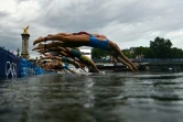 Départ du triathlon féminin des Jeux dans la Seine, le 31 juillet 2024
