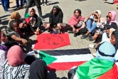 Des Soudanais manifestent contre le pouvoir militaire à Omdourman, banlieue nord-ouest de la capitale Khartoum, le 14 février 2022